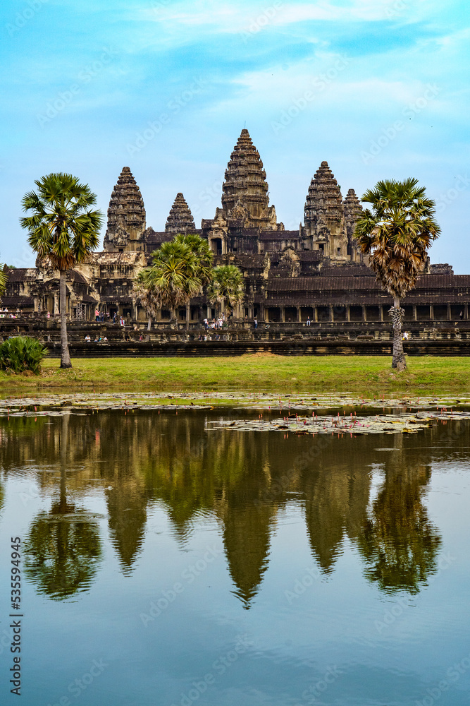 Cambodia. Siem Reap Province. Angkor Wat (Temple City) and its reflection in the lake. A Buddhist and temple complex in Cambodia and the largest religious monument in the world Cambodia. Siem Reap Province. Angkor Wat (Temple City) and its reflection in the lake. A Buddhist and temple complex in Cambodia and the largest religious monument in the world