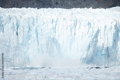 Glacier calving into the ocean with a huge splash,  © DaiMar