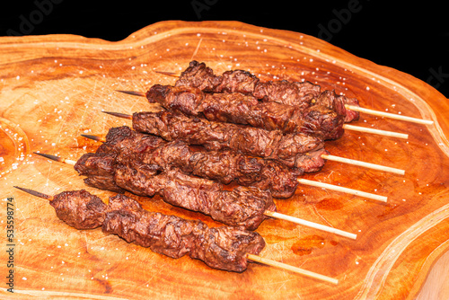 delicious meat kebab  on the table  made in the fire
