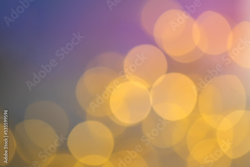 Abstract bokeh on blurred y pastel purple background