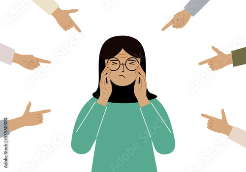 The concept of public condemnation, victim blaming and bullying. Crying depressed woman. The fingers point at the character and hate him. Internet cyberbullying.