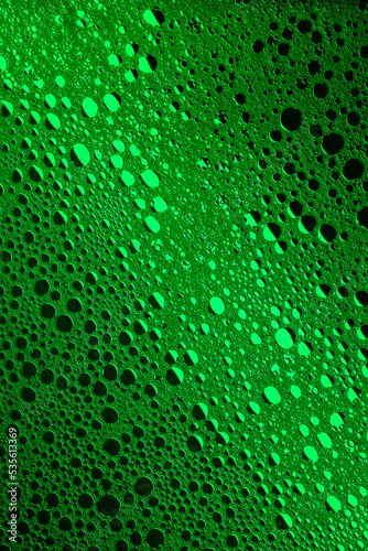 Green abstract, texture background of soap bubbles on water. Background for screen saver, cover, wallpaper. High quality photo