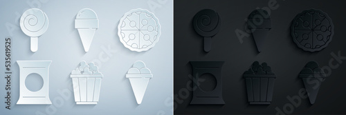 Set Popcorn in box, Pizza, Bag packet potato chips, Ice cream waffle cone, and Lollipop icon. Vector