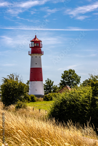 Lighthouse at Geltinger Birk  Baltic Sea  Germany. Bright blue sky.