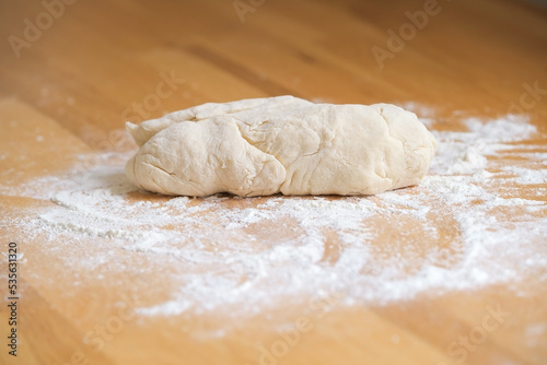 Dough on a wooden board