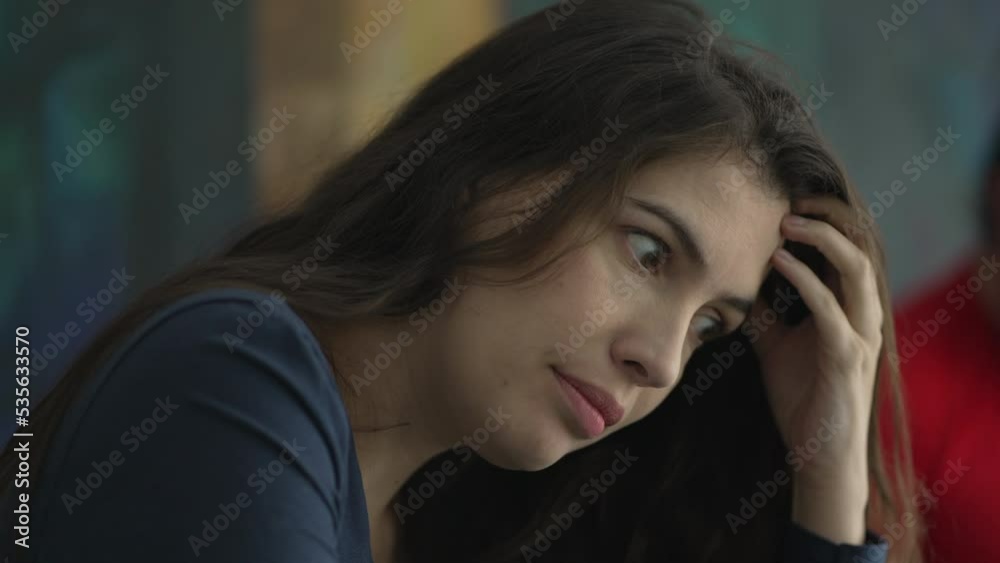 Pensive anxious woman with emotional problems. Nervous person remembering trauma Pensive anxious woman with emotional problems. Nervous person remembering trauma