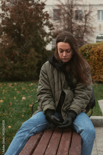 portrait of crying young woman on the street
