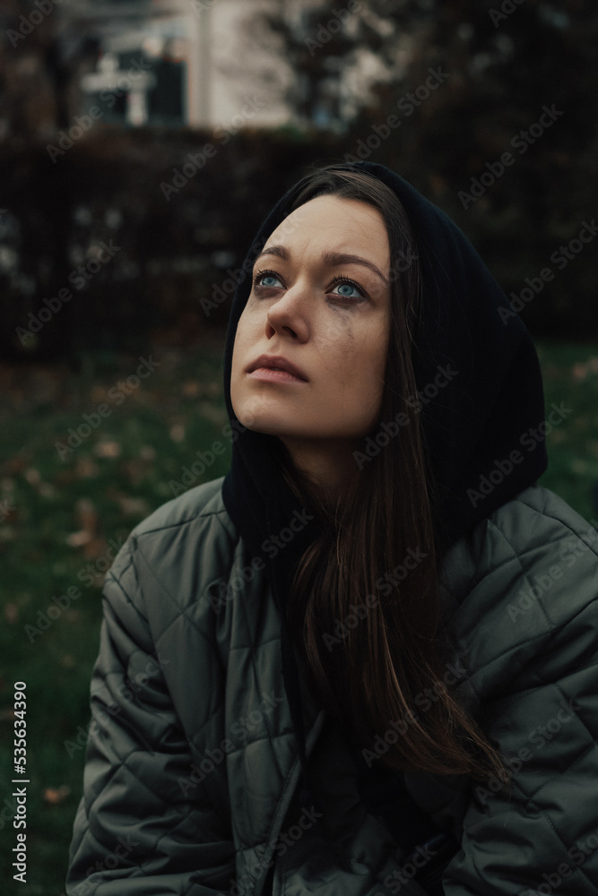 portrait of crying young woman on the street portrait of crying young woman on the street