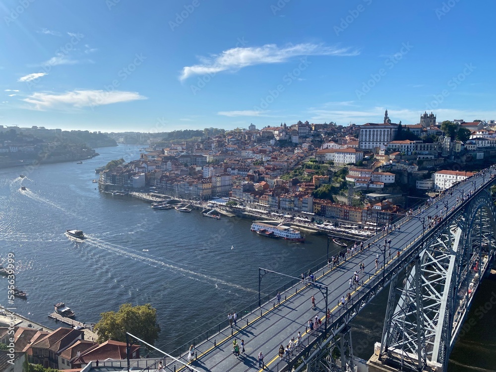 Massive crossing bridge over the Douro river in Porto, Portugal skyline cityscape scene