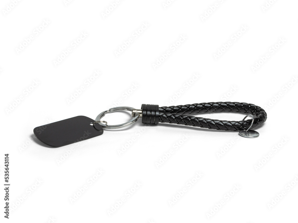 key chain, metal and leather material key chain on a white background key chain, metal and leather material key chain on a white background