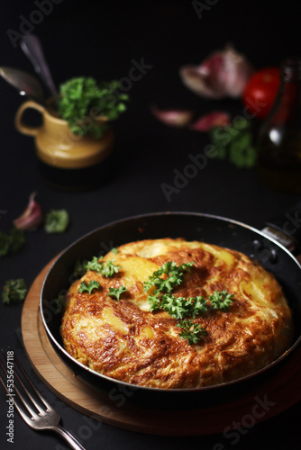 Traditional Spanish dish tortilla on the table 