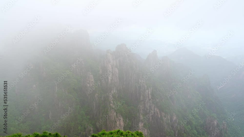 aerial view of yellow mountain in foggy day