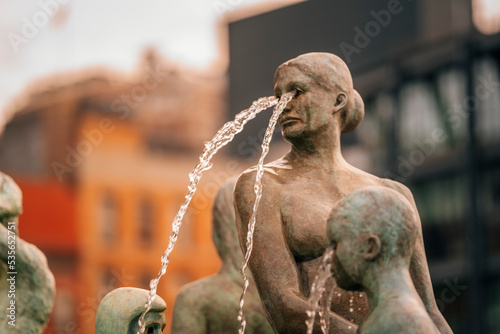 statue water fountain woman crying tears New York 