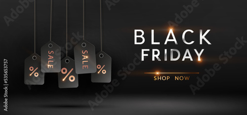 Black Friday Shop Now promotion banner. Realistic labels with golden sale, discount tag. Vector dark background, poster, special offer template