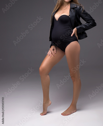 pregnant woman in black lingerie