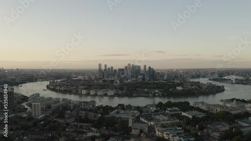 Skyline of the city of London and Canary Wharf, from Greenwich sunset. Camera track. 