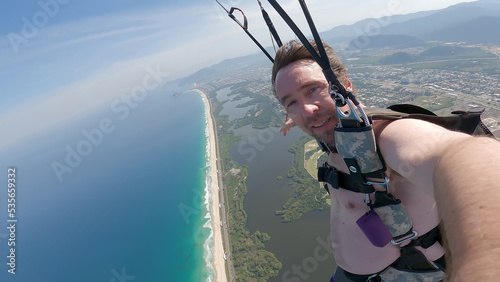 Skydiving selfie over the beach