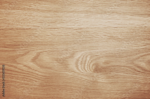 Brown wood texture with beautiful grain. Background of natural wood surface.