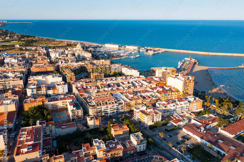 Fototapeta premium Drone photo of Benicarlo with view of port and residential buildings along sea coast. North of Province of Castello, Spain.