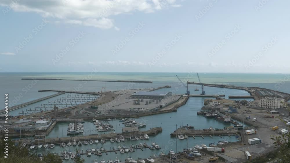 A high angle overlook of a sea port with boats. Dover, England. A high angle overlook of a sea port with boats. Dover, England.