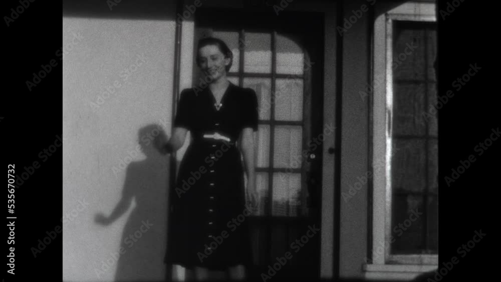 Visiting with Mother 1938 - A young woman visits with her mother on the front porch of the mother's home in Los Angeles, California in 1938.