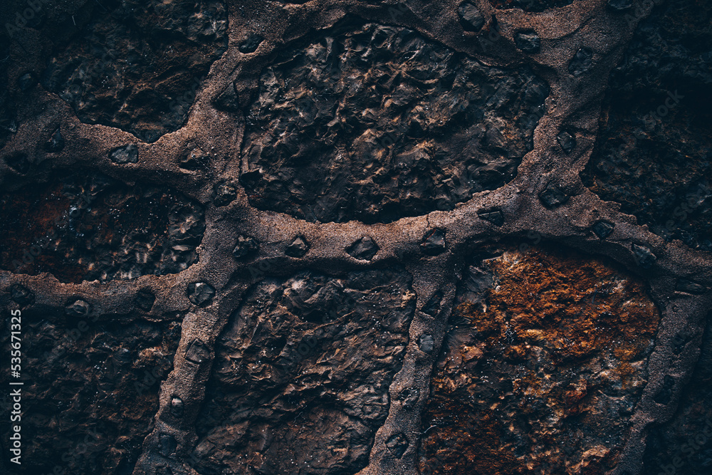 Brown texture. Stone background. Rock texture. Grunge Rough structure. Abstract texture. Rock surface with cracks. Rock pile. Paint spots wall. Wall marble.