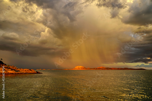 Lake Argyle in far north Western Australia in the sunset and rain