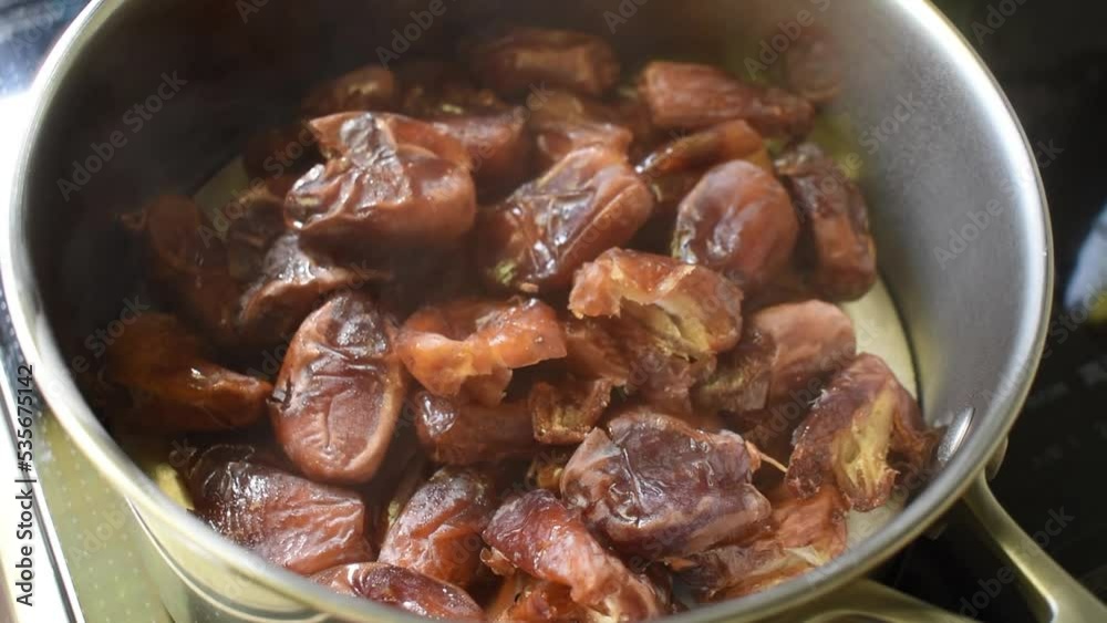 Date fruits are steamed to soften for filling sweets. for ramadan sweets. Date fruits are steamed to soften for filling sweets. for ramadan sweets.
