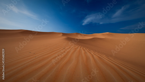 Sahara desert landscape with wavy sand pattern 3D render image