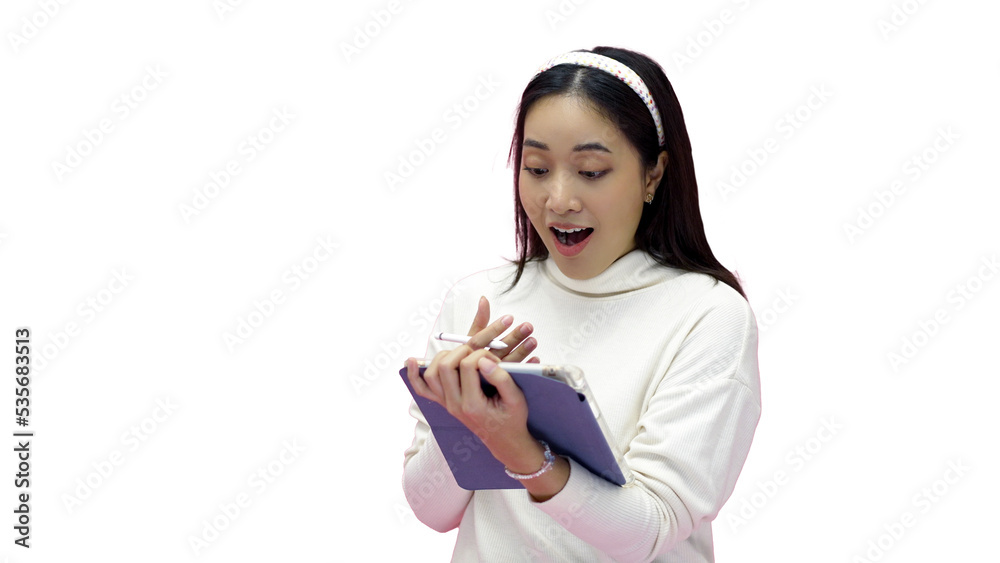 Asian woman smiling and using mobile phone with tablet and excited for online shopping on isolated pink background. Asian woman smiling and using mobile phone with tablet and excited for online shopping on isolated pink background.
