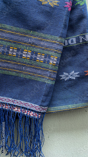 Ulos or traditional Batak Toba cloth with colorful patterns. photo