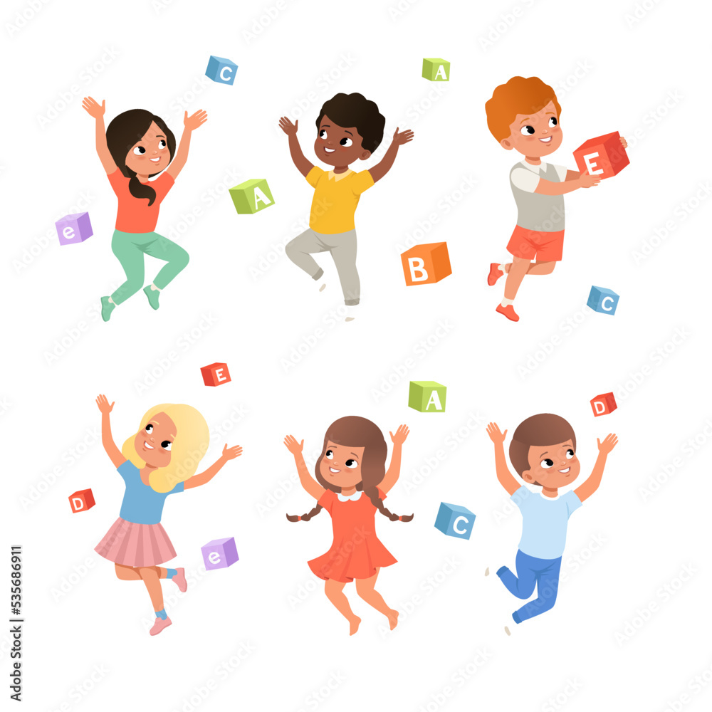 Happy kids throwing colorful cubes with letters set. Kids education and