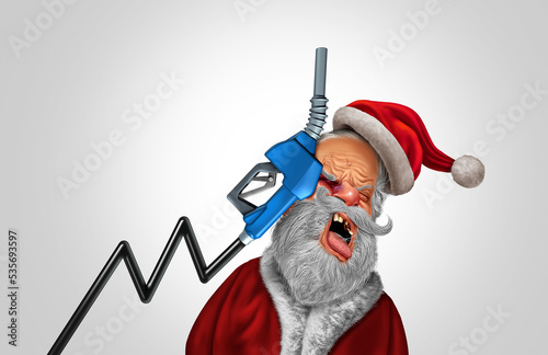 Rising Winter Energy Prices and holiday gas increase or rising oil price during Christmas season as an Inflation pain concept as Santa Claus hit hard by a gas pump  photo