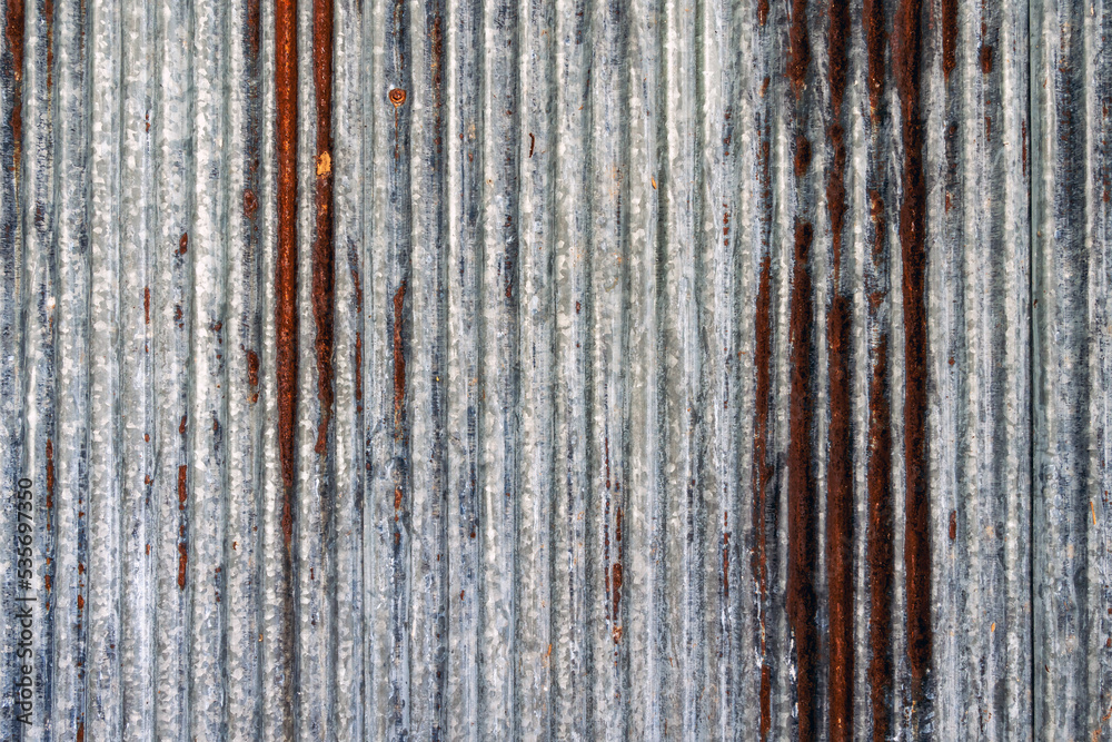 Artistic of old and rusty zinc sheet wall. Vintage style metal sheet roof texture. Pattern of old metal sheet. Rusting metal or siding. Corrosion of galvanized. Background and texture in retro concept Artistic of old and rusty zinc sheet wall. Vintage style metal sheet roof texture. Pattern of old metal sheet. Rusting metal or siding. Corrosion of galvanized. Background and texture in retro concept