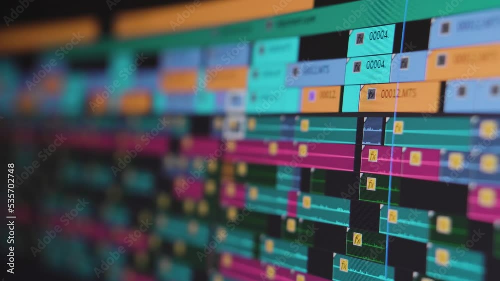 Video editing. Playhead moving through a complex timeline. Screen close up