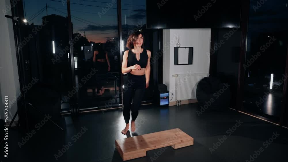 Athletic Beautiful Woman Does exercises Cross Fitness and Bodybuilding Gym Training with Aerobic Step 4k Athletic Beautiful Woman Does exercises Cross Fitness and Bodybuilding Gym Training with Aerobic Step 4k