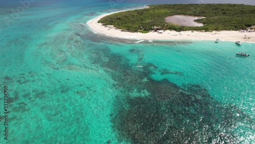 People Snorkeling Near Prickly Pear Cays Off The Coast Of  The Caribbean Island Of Anguilla