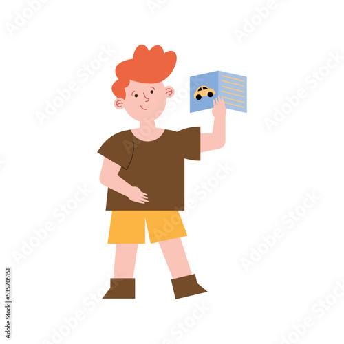 schoolboy reading book