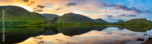 The ruins of Kilchurn castle on Loch Awe at sunset in Scotland