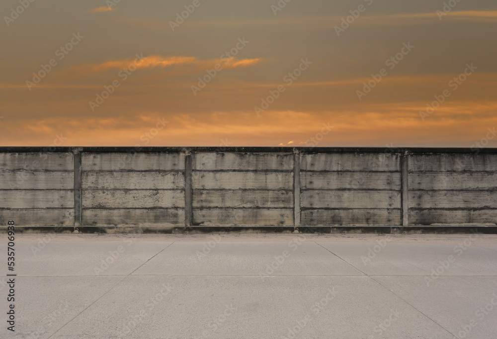 Concrete wall and the twilight sky background.