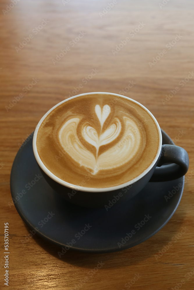 Coffee mugs placed on a table in a coffee shop. Coffee mugs placed on a table in a coffee shop.
