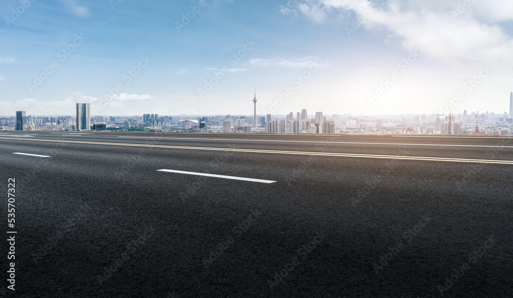 Fototapeta premium Road and modern city buildings landscape skyline