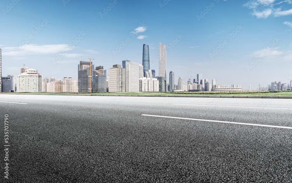 Road and modern city buildings landscape skyline Road and modern city buildings landscape skyline