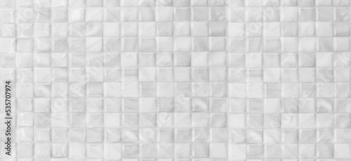 White tile stone wall Texture in weathered and have natural surfaces.