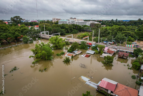 High-angle view of the Great Flood, Meng District, Thailand, on October 3, 2022, is a photograph from real flooding. With a slight color adjustment
