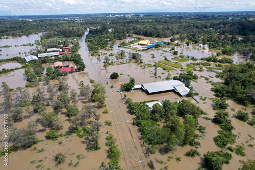 High-angle view of the Great Flood, Meng District, Thailand, on October 3, 2022, is a photograph from real flooding. With a slight color adjustment
