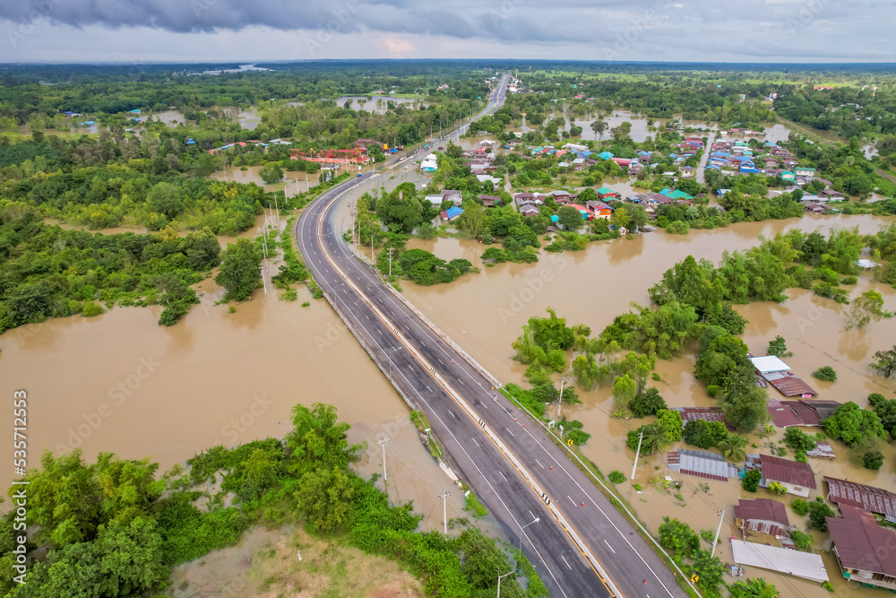 High-angle view of the Great Flood, Meng District, Thailand, on October 3, 2022, is a photograph from real flooding. With a slight color adjustment
