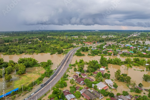 High-angle view of the Great Flood, Meng District, Thailand, on October 3, 2022, is a photograph from real flooding. With a slight color adjustment
