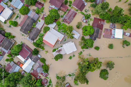 High-angle view of the Great Flood, Meng District, Thailand, on October 3, 2022, is a photograph from real flooding. With a slight color adjustment

