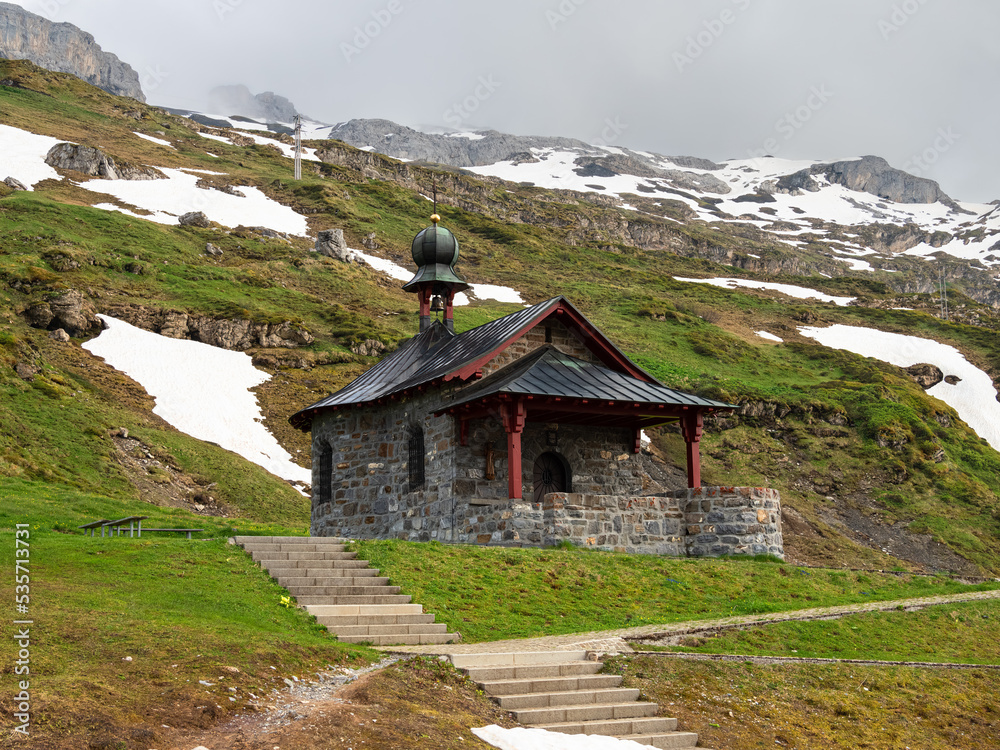 A stone chapel of the holy brother Nikolaus - Bruder Klaus - at Klausen pass in Switzerland A stone chapel of the holy brother Nikolaus - Bruder Klaus - at Klausen pass in Switzerland